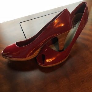 Fire Engine red, peekaboo toe, patent leather.